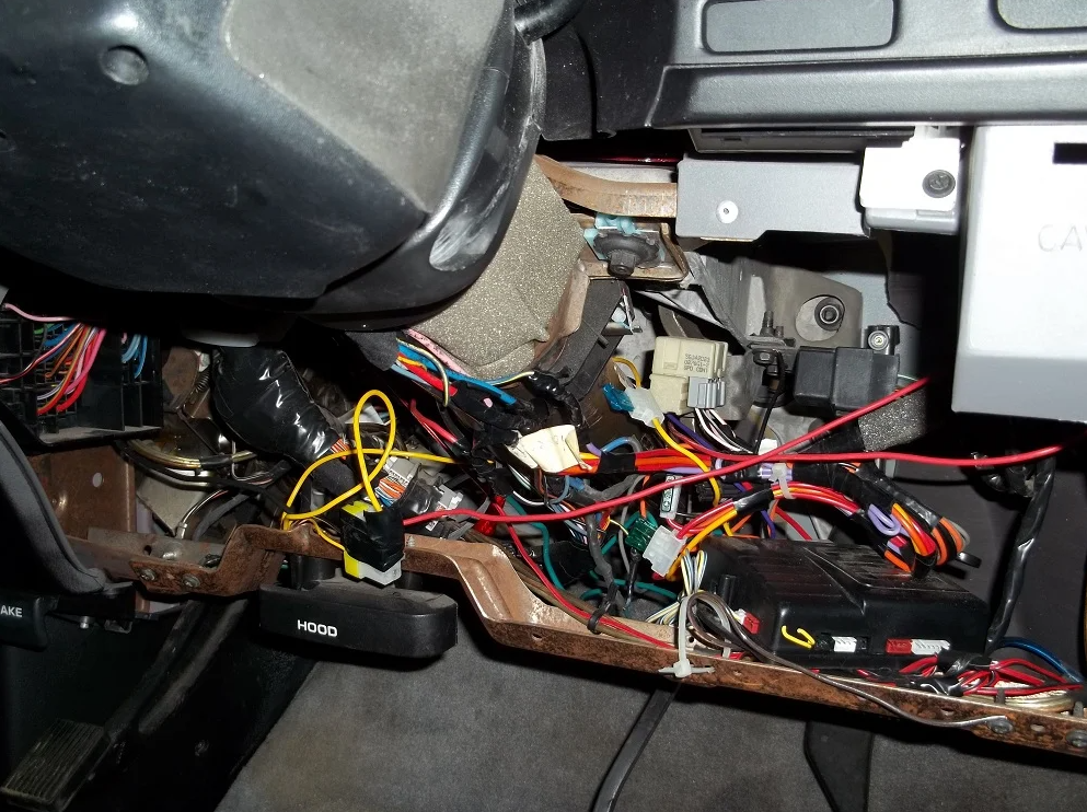 The old way: a traditional kill switch wired in by cutting and splicing factory wires